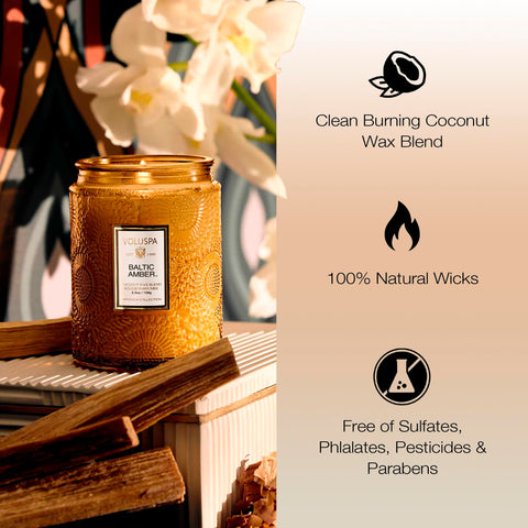 Voluspa Baltic Amber jar lit with a soft glow for relaxing spaces.