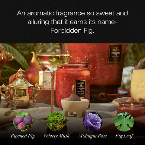 Voluspa Forbidden Fig candle in decorative glass jar enhancing home decor