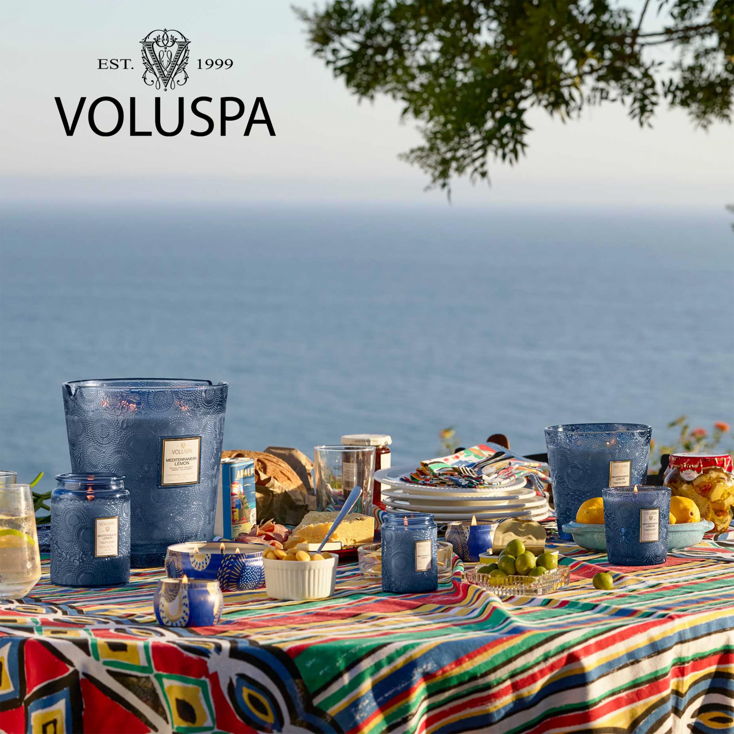 Voluspa candle in a room ambiance setting during a gathering