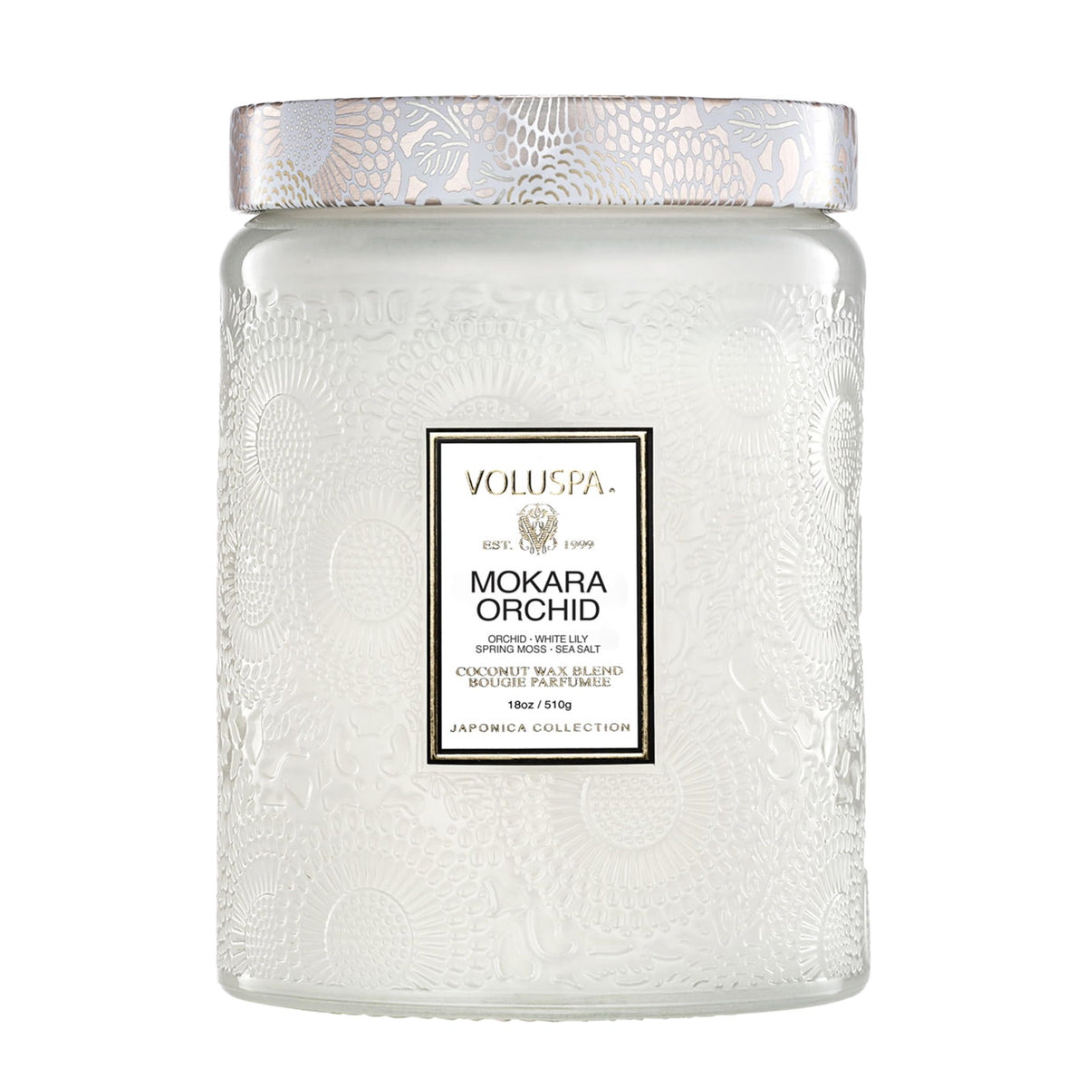 Voluspa Mokara Orchid 18 oz candle in a decorative jar for floral ambiance.