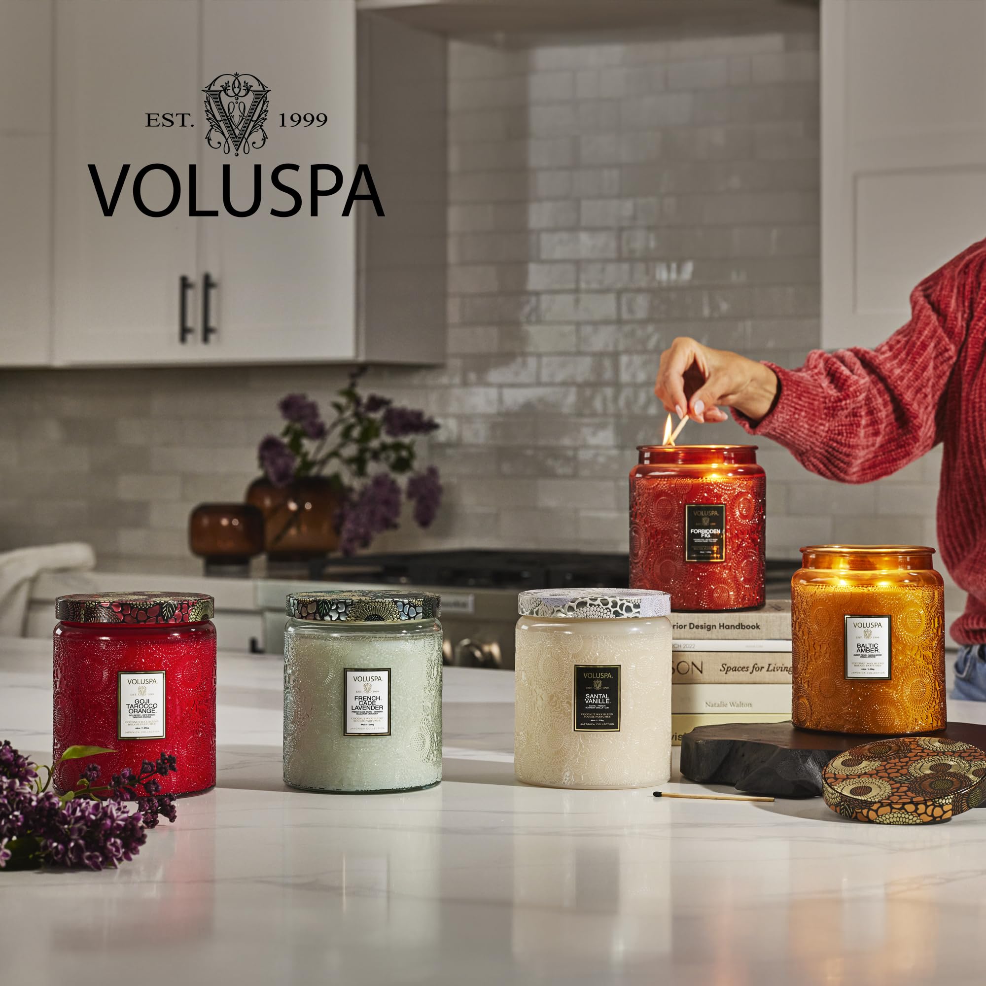 Voluspa Panjore Lychee candle lit, up to 100 hours of fragrance and ambiance.