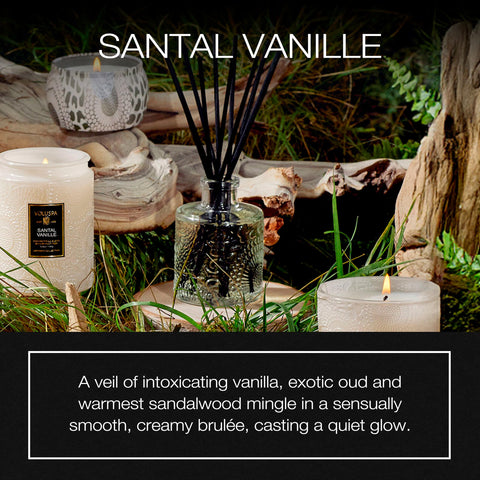 Voluspa Santal Vanille diffuser sticks releasing soothing scent through natural reeds.
