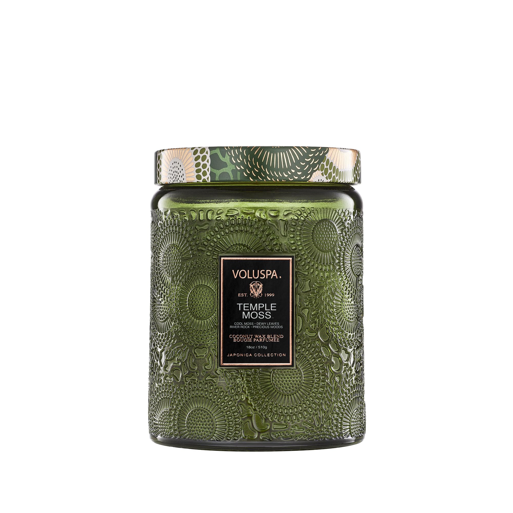 Voluspa Temple Moss candle jar front view, enhancing calm ambiance with earthy fragrance.