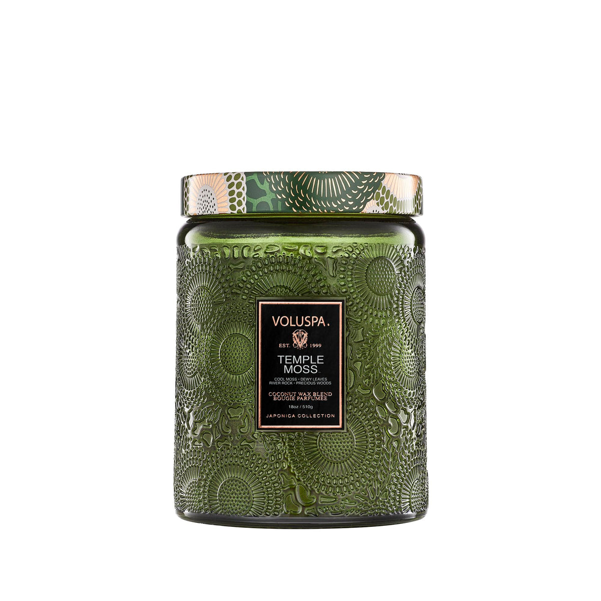 Voluspa Temple Moss candle jar front view, enhancing calm ambiance with earthy fragrance.