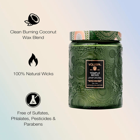 Voluspa Temple Moss candle jar with wood-toned glass, ideal for cozy spaces.