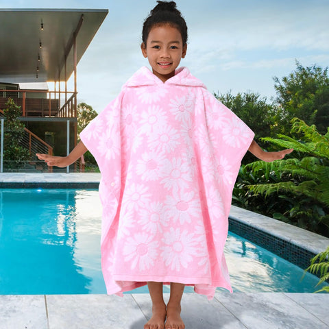 VOOVA & MOVAS pool-ready poncho worn by child after swim.