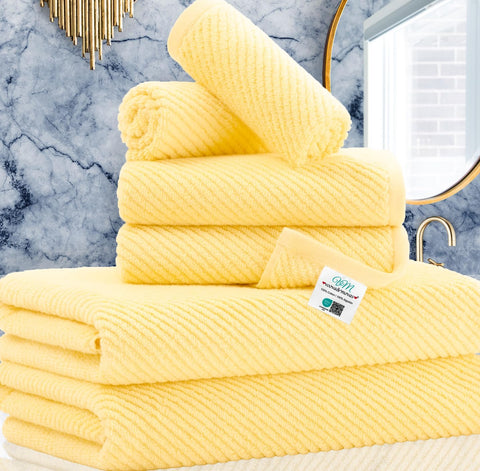 VOOVA and MOVAS yellow towel set front view, showcasing soft fabric