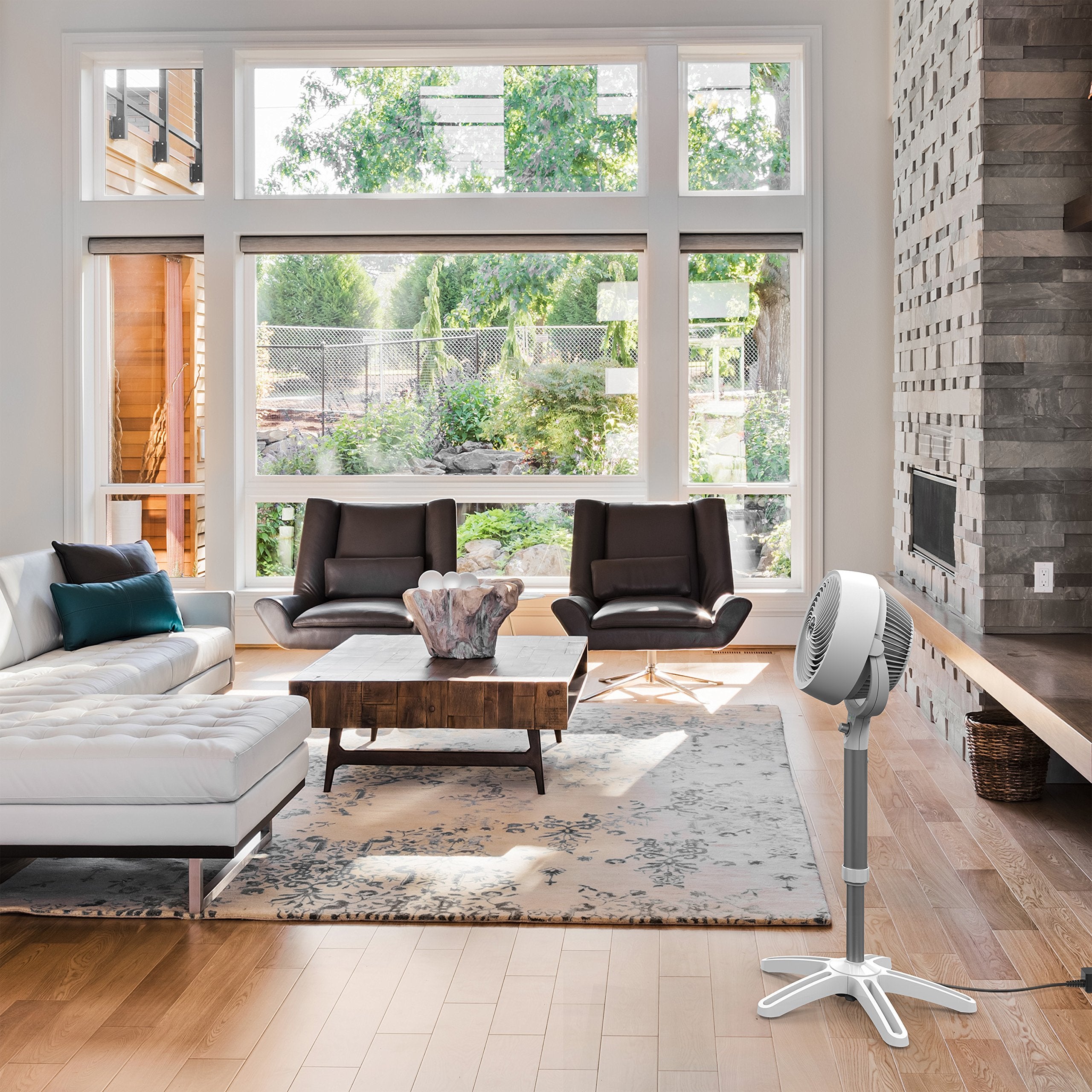 Vornado 683DC side view showing height-adjustable design for flexible placement.