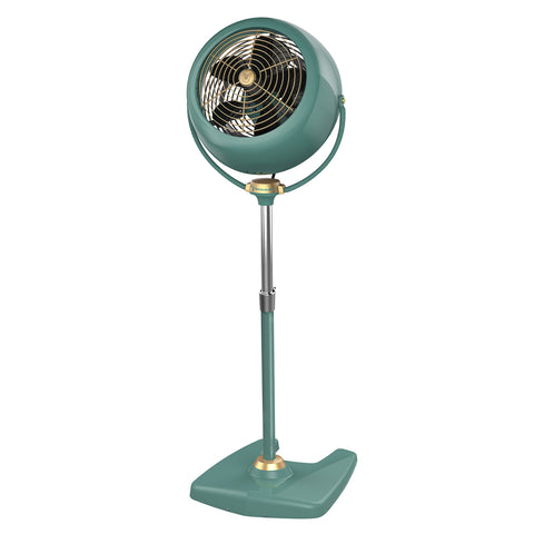 Vornado VFAN Sr pedestal fan with metal base provides durable, classic cooling in a living room.