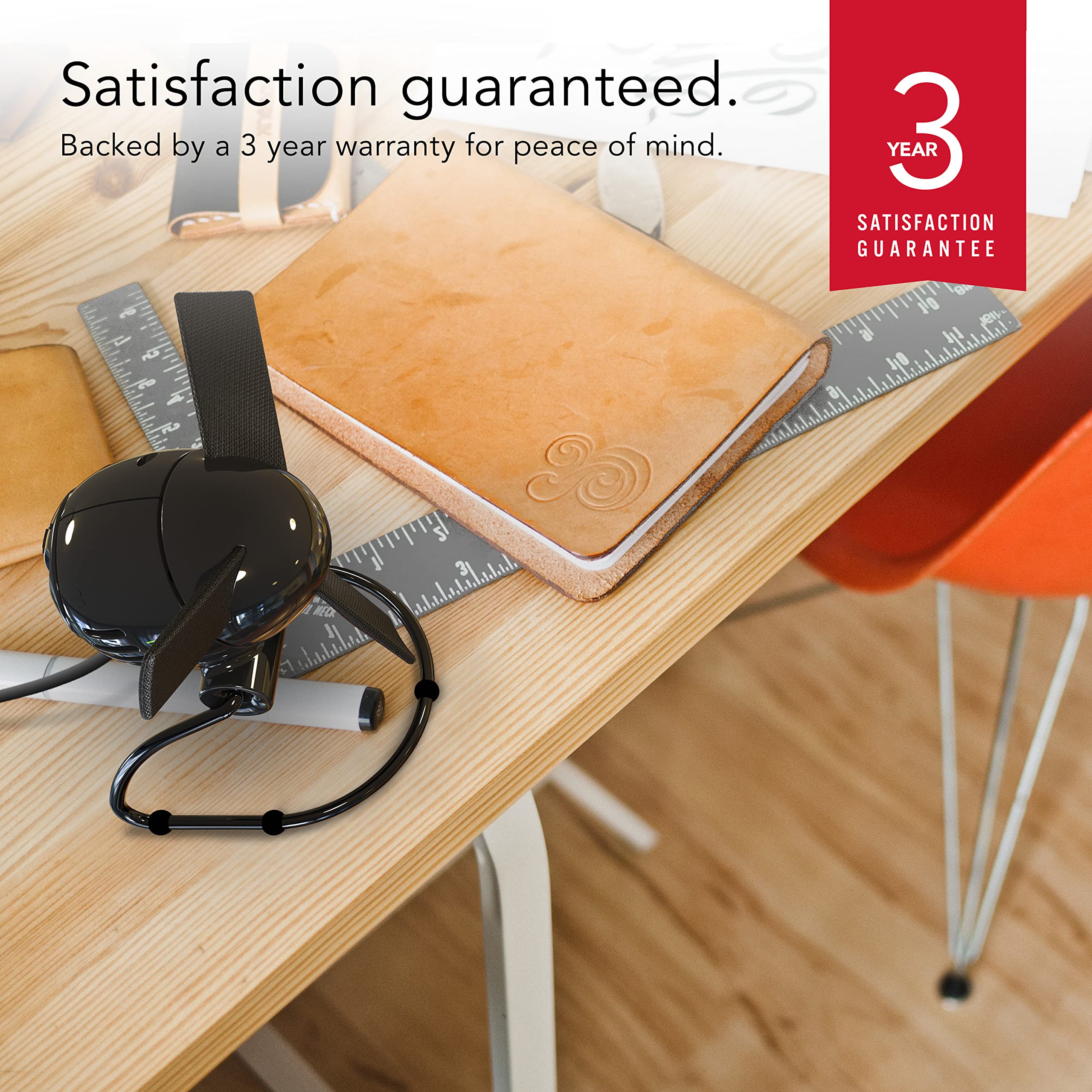 Vornado Zippi black compact fan complements desks in modern spaces.