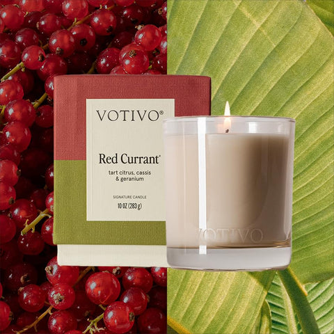 Votivo Signature candle in clear jar enhances home décor with luxe scent.