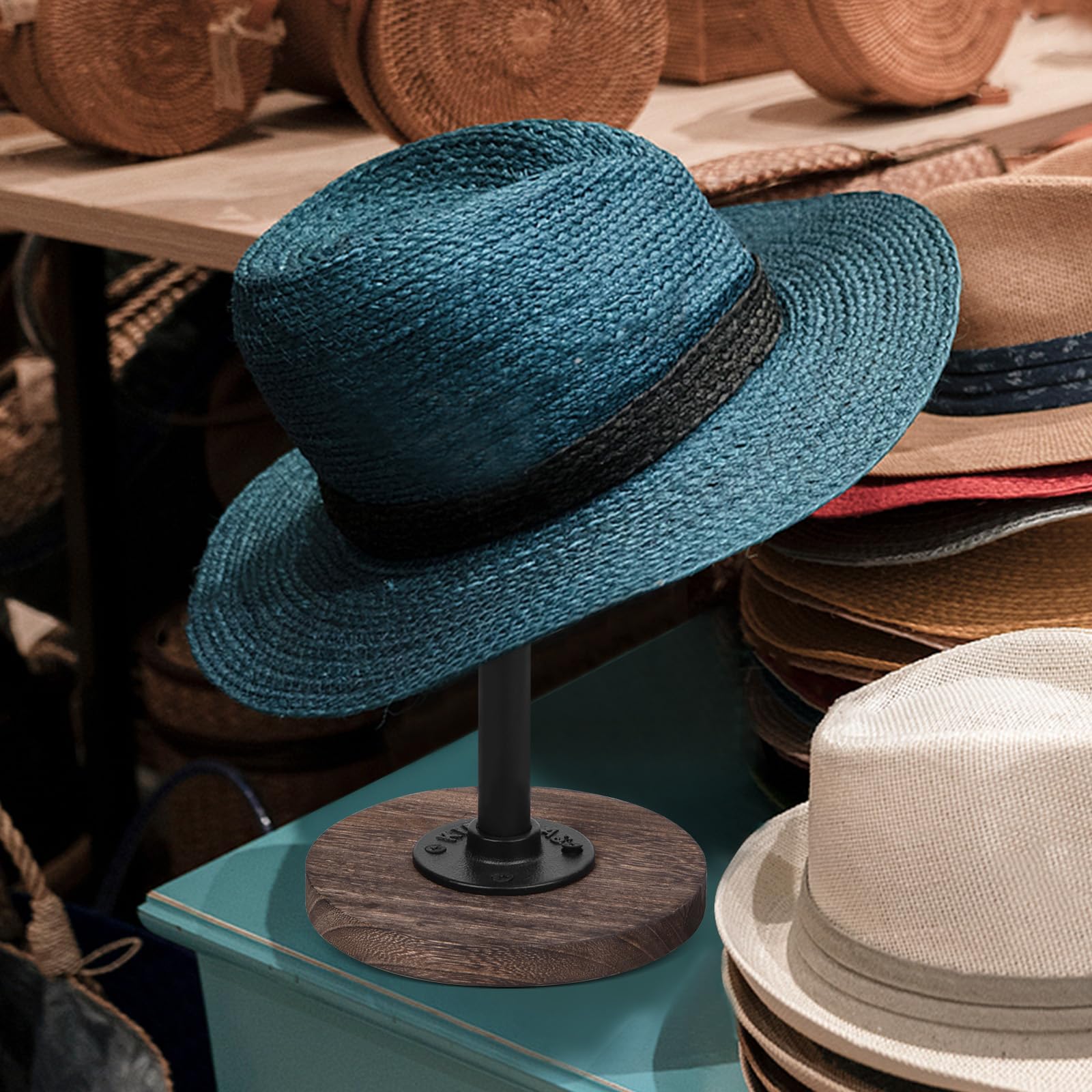 Vrietina desk display showcases hats, wigs, or jewelry on a compact surface.
