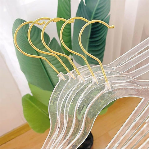 VSV Storage crystal-clear hangers create a cohesive, minimalist wardrobe.