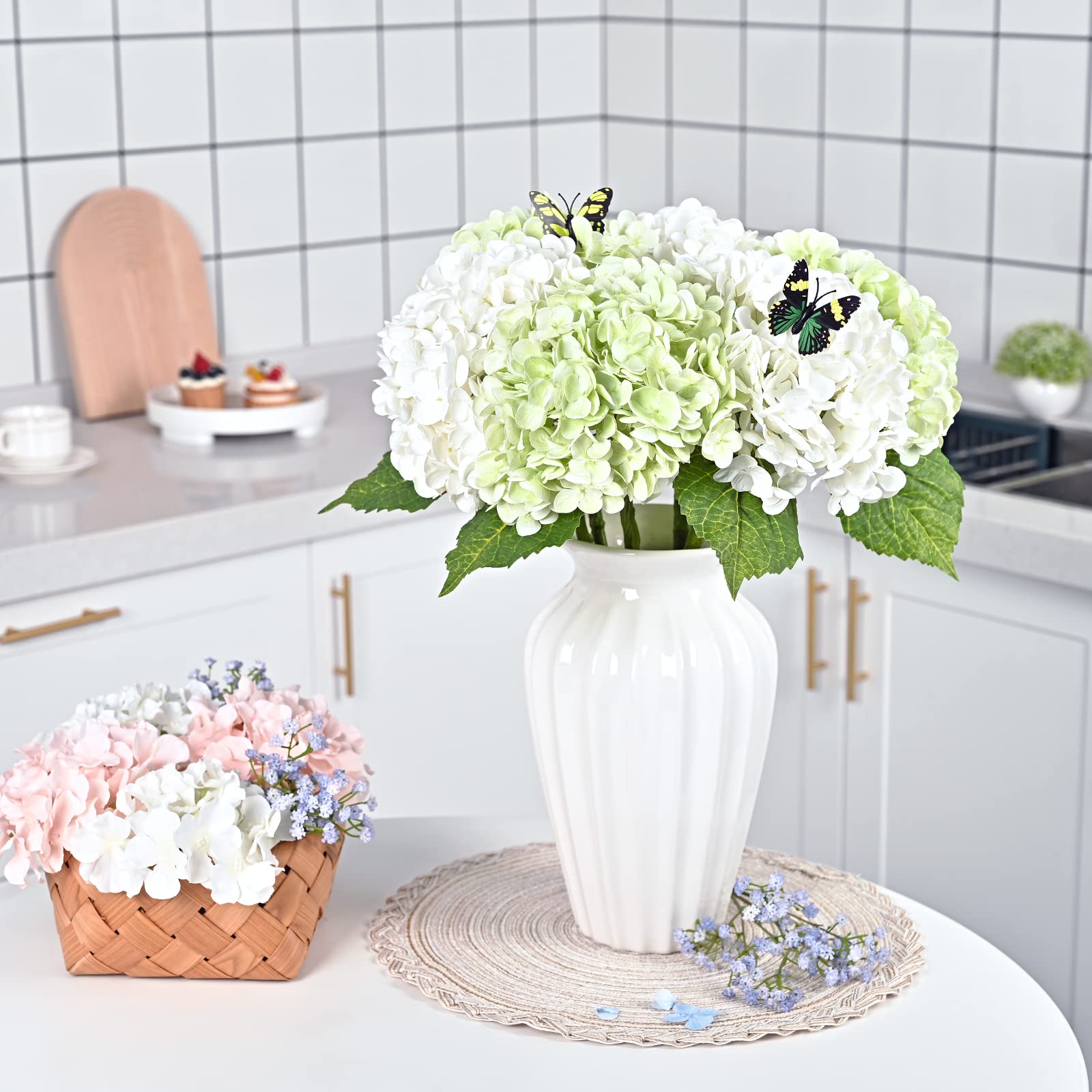 Waipfaru butterflies with hydrangea accent enhance romantic arrangements