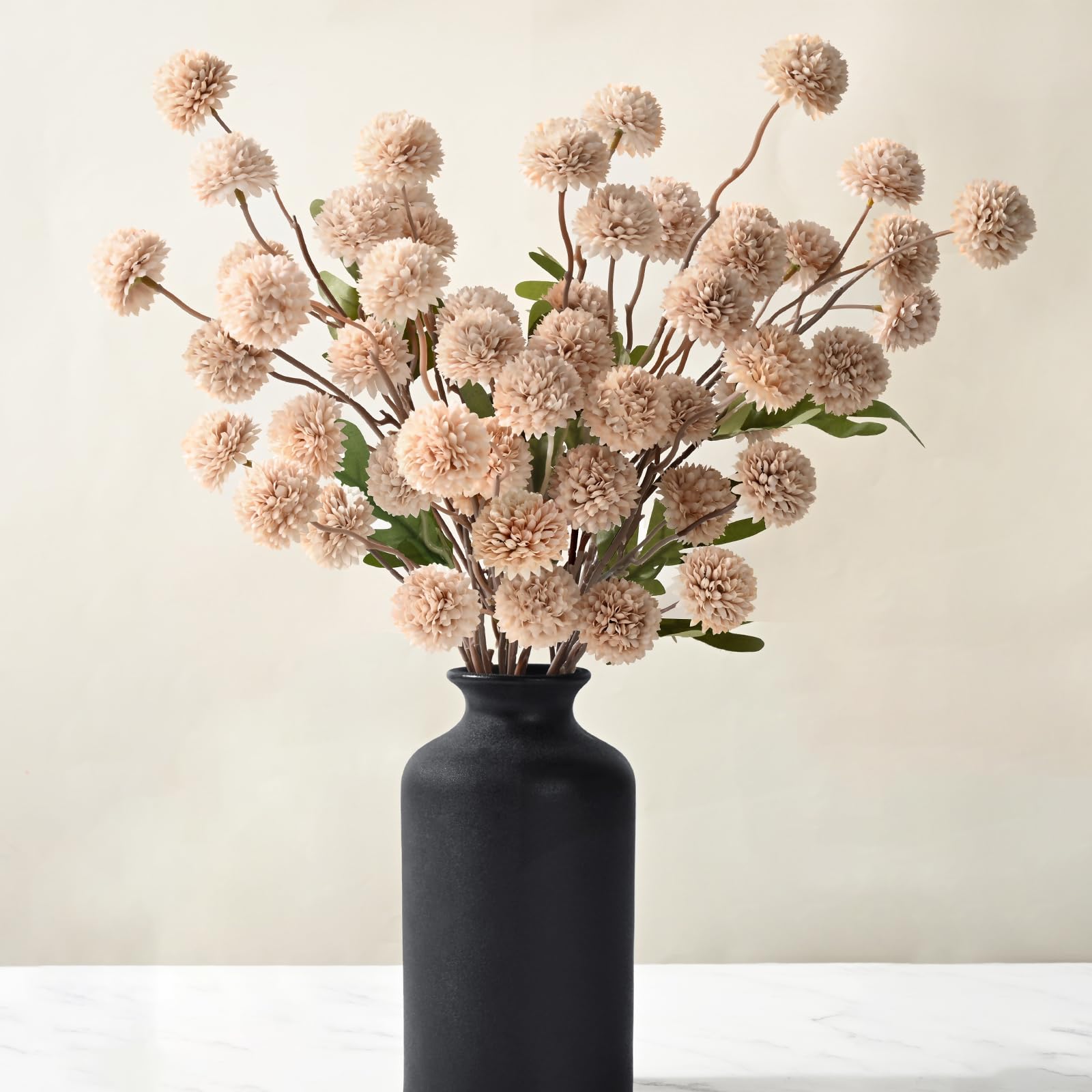 Waipfaru mini chrysanthemum stems for lush centerpieces with minimal upkeep.