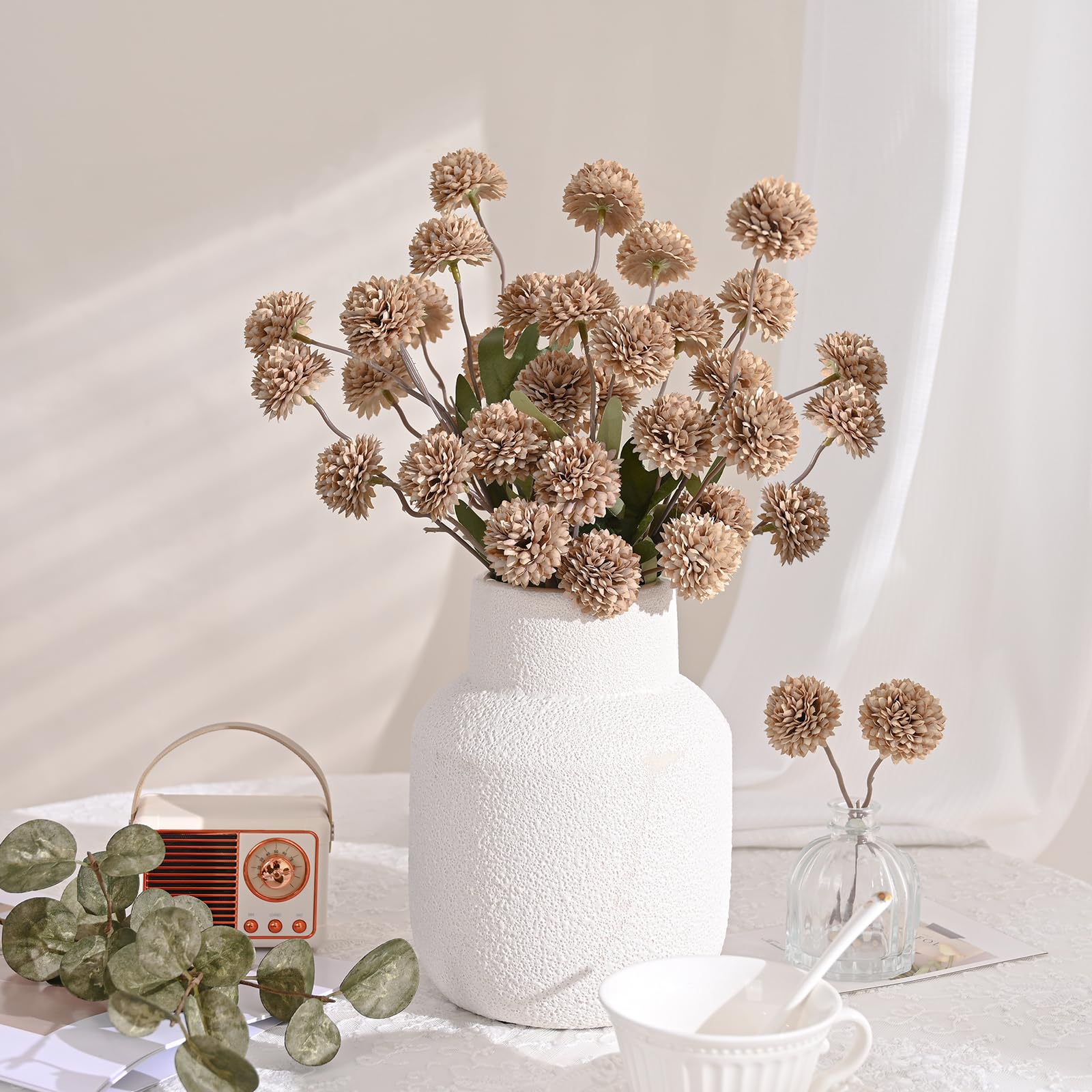 Waipfaru eucalyptus foam leaves add lifelike texture and resilience.