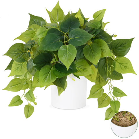 Waipfaru faux plants in ceramic pot add modern greenery to living spaces.