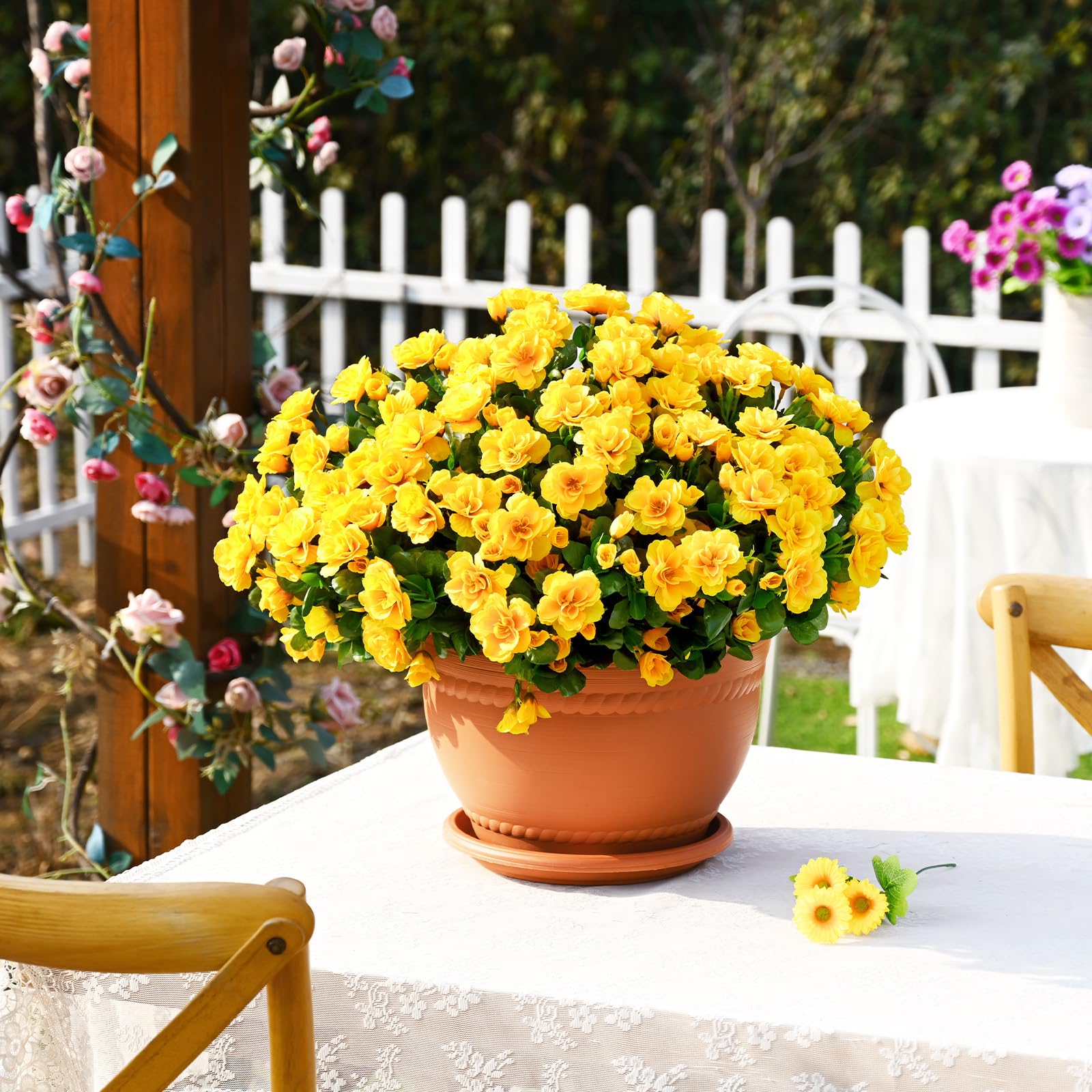 Waipfaru front door porch display enhances curb appeal with vivid blooms.