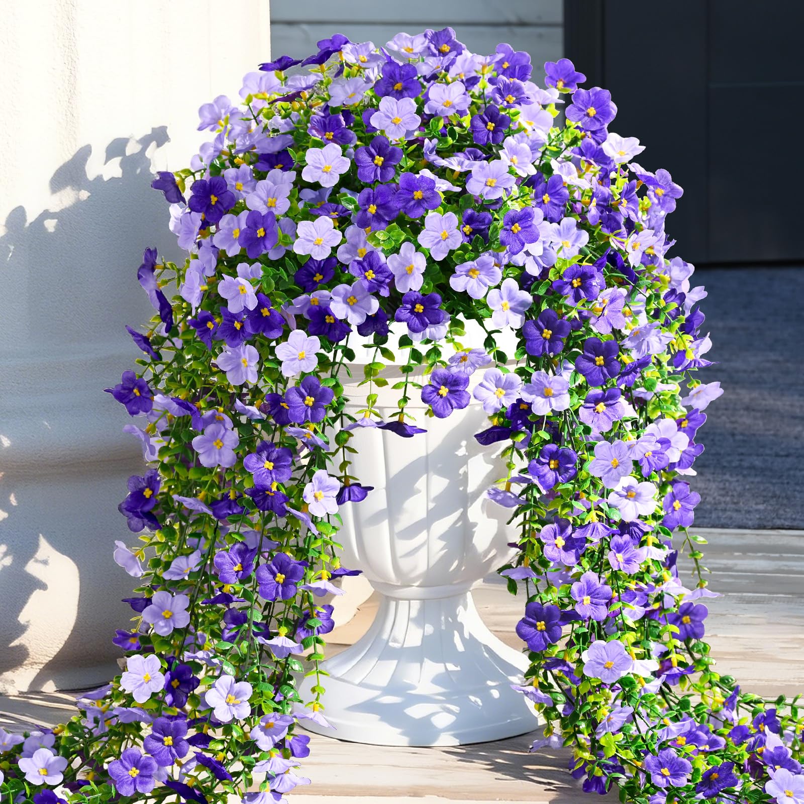 Waipfaru hanging flowers for planters to frame doorways.