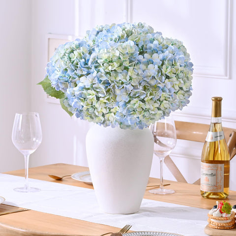 Waipfaru Hydrangea wedding centerpiece in blue adds timeless charm.