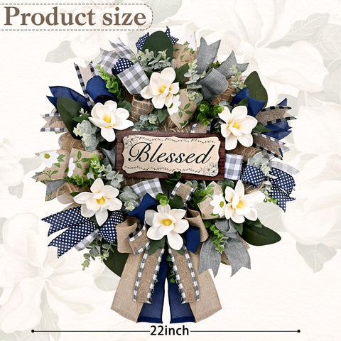Waipfaru magnolia wreath with blue-grey burlap bow for year-round porch charm.