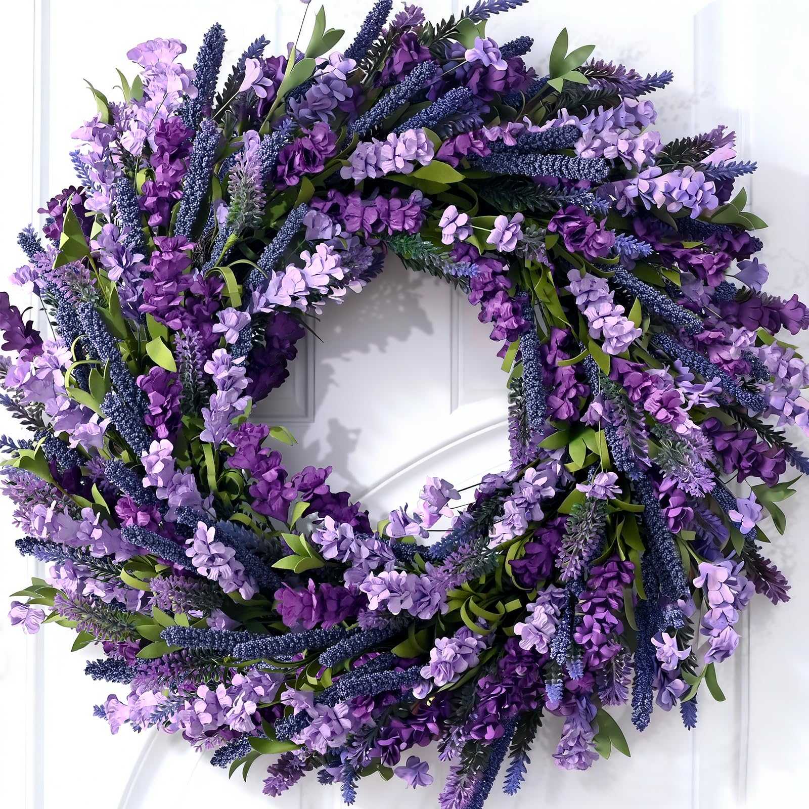Waipfaru front-door lavender wreath with forsythia accents to boost curb appeal.