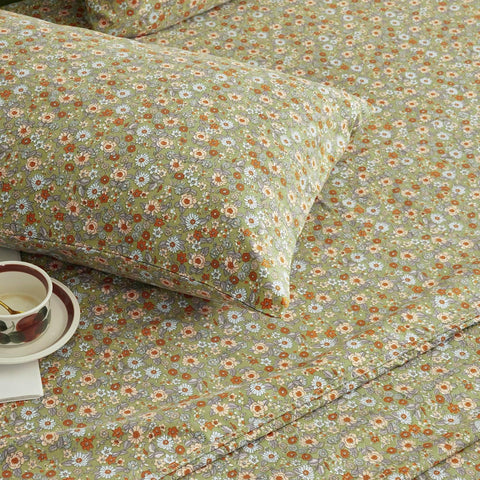 Wake In Cloud deep-pocket fitted sheet stretches over mattress with secure, wrinkle-free fit