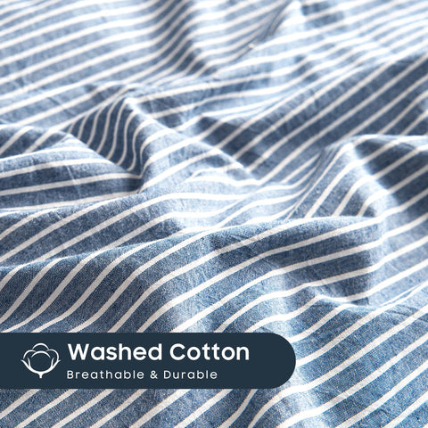 Wake In Cloud durable washed cotton texture with a soft feel in denim blue.