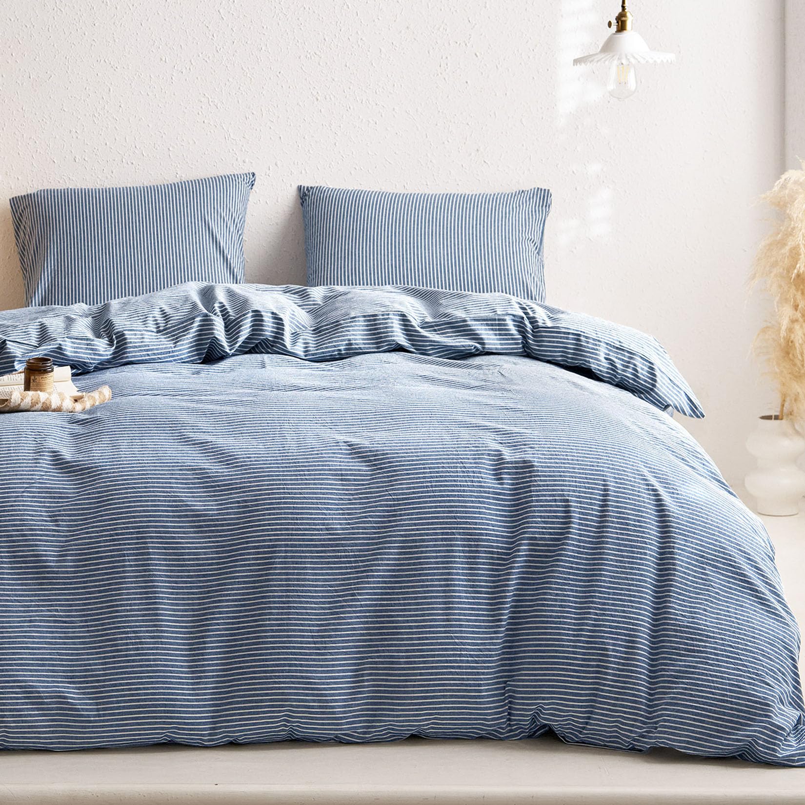 Wake In Cloud lightweight percale bedding in denim blue, ideal for year-round comfort.