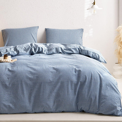 Wake In Cloud lightweight percale bedding in denim blue, ideal for year-round comfort.