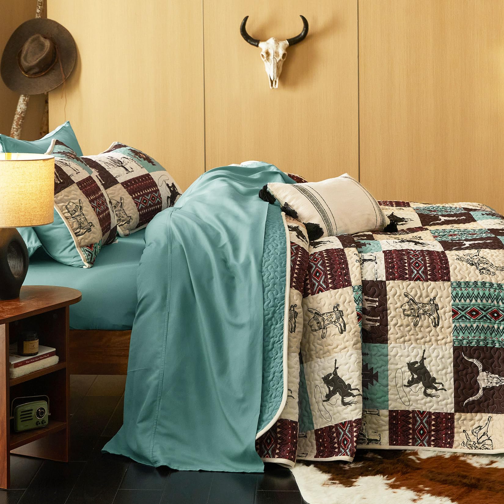 Wake In Cloud reversible bedspread shows turquoise taupe sides.