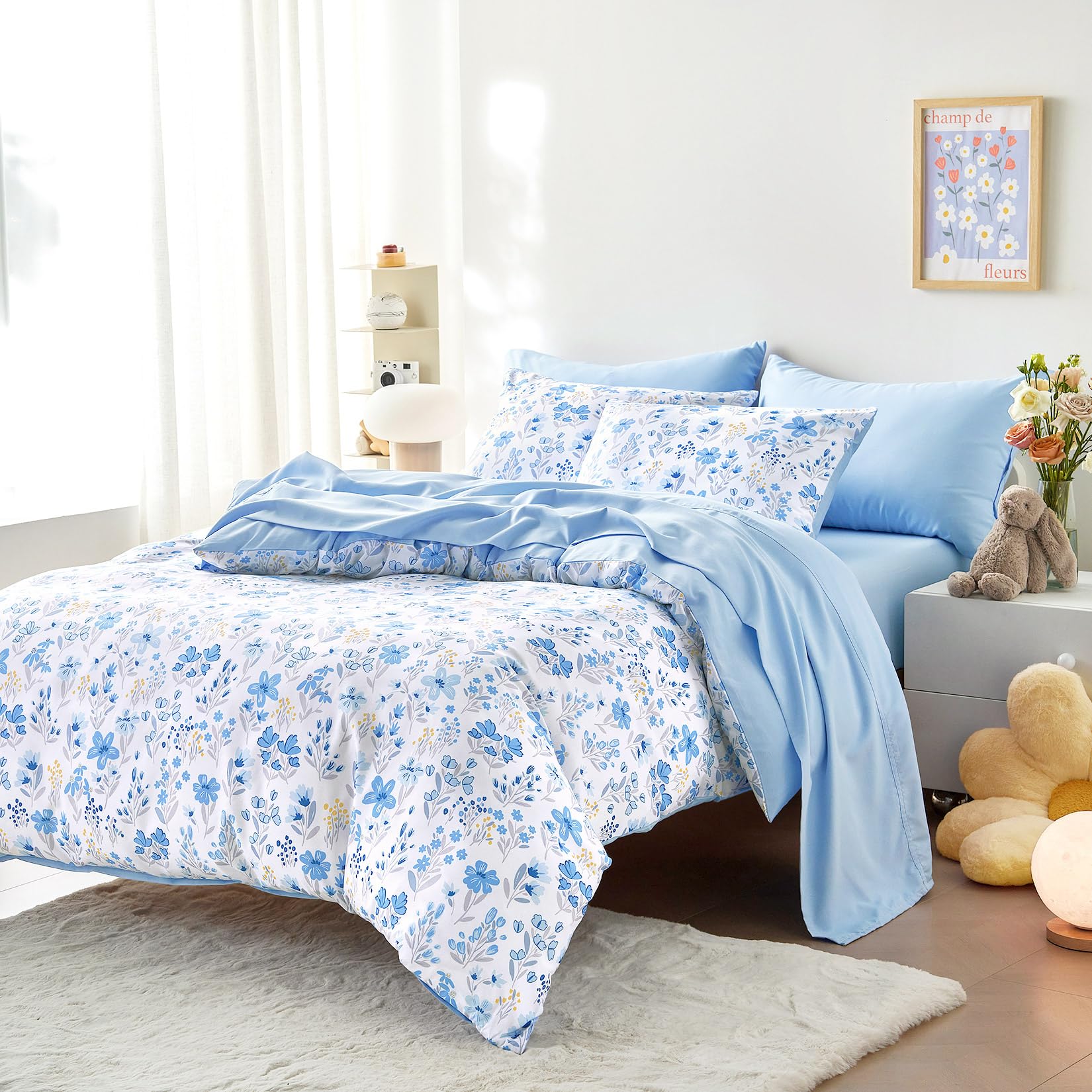 Wake In Cloud blue white floral flat sheet displays cheerful botanical design