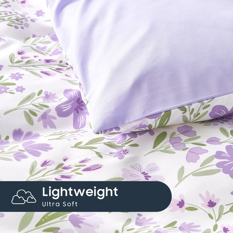Wake In Cloud purple-white floral pattern close-up highlighting petals.