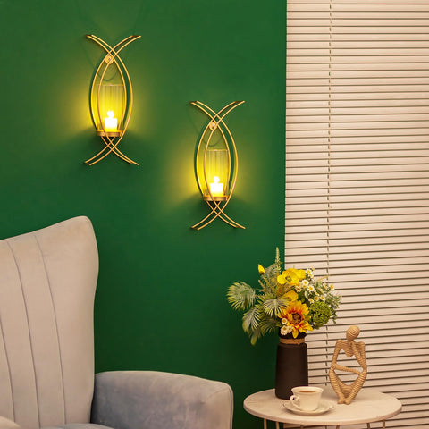 Walasis hurricane glass paired with gold holders adds glamorous glow in bedrooms.