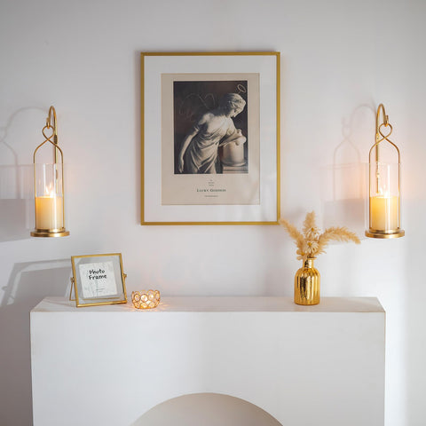 Walasis gold hurricane lantern with metal frame adds modern charm