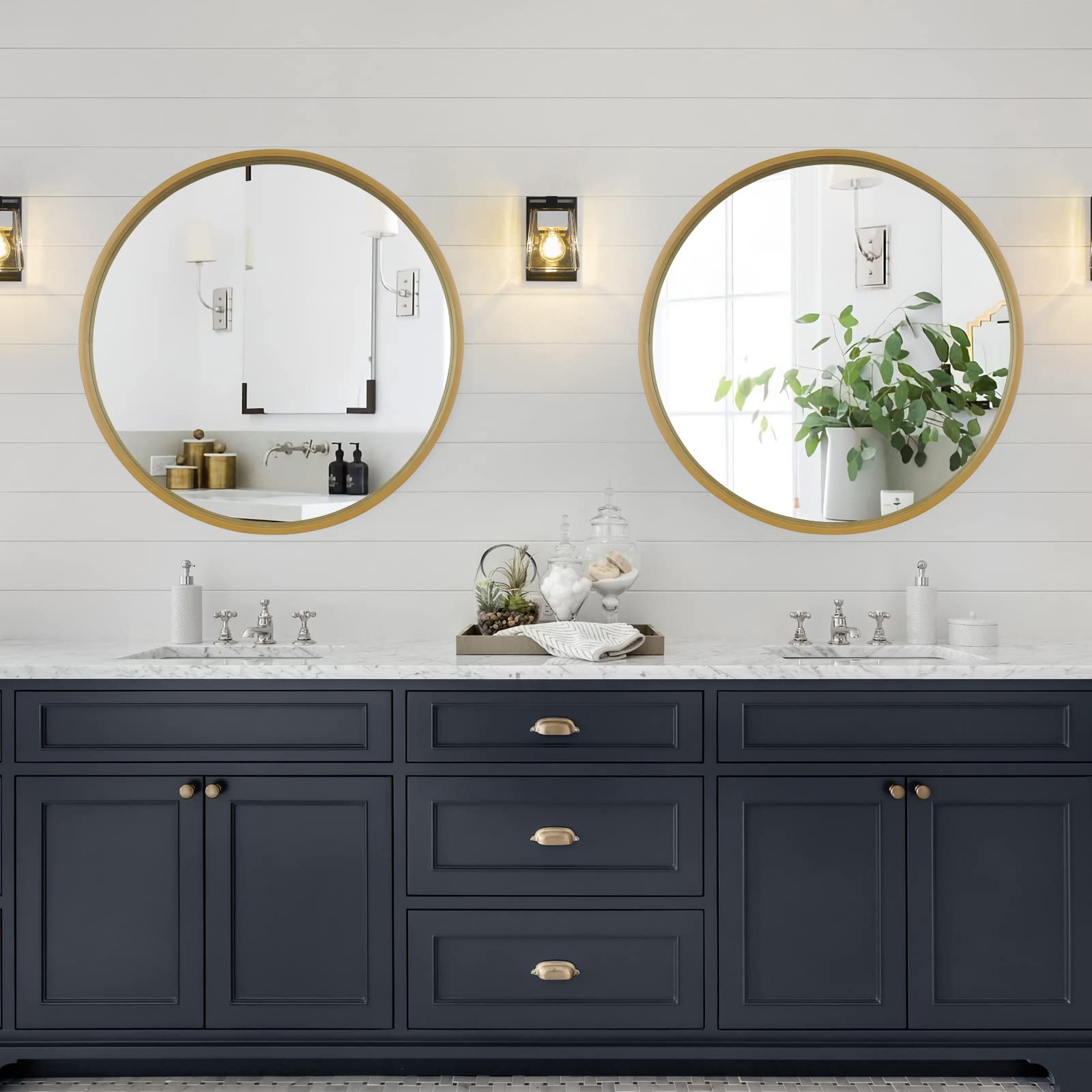 WallBeyond round mirror above bathroom vanity brightens the area with crisp reflection