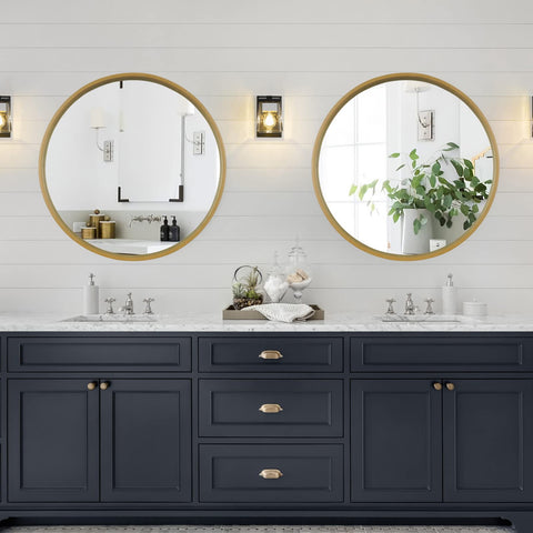 WallBeyond round mirror above bathroom vanity brightens the area with crisp reflection