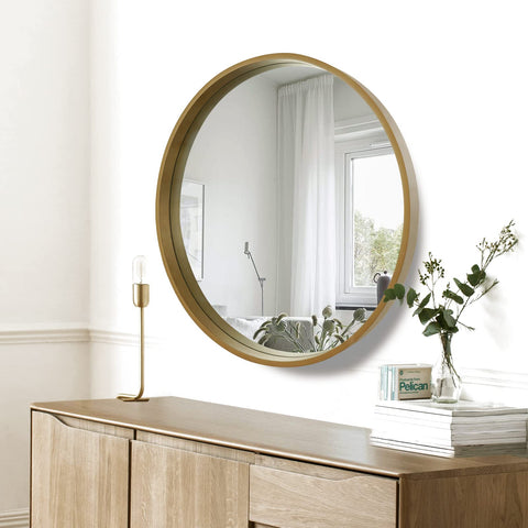 WallBeyond round mirror in living room setup reflects light and enhances space