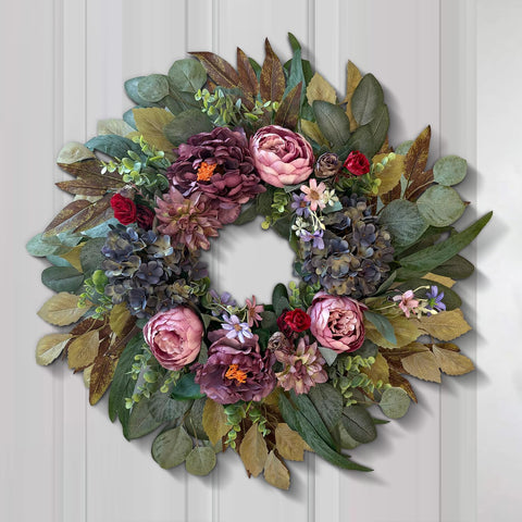 WANNA-CUL wreath on entryway creates a warm seasonal welcome
