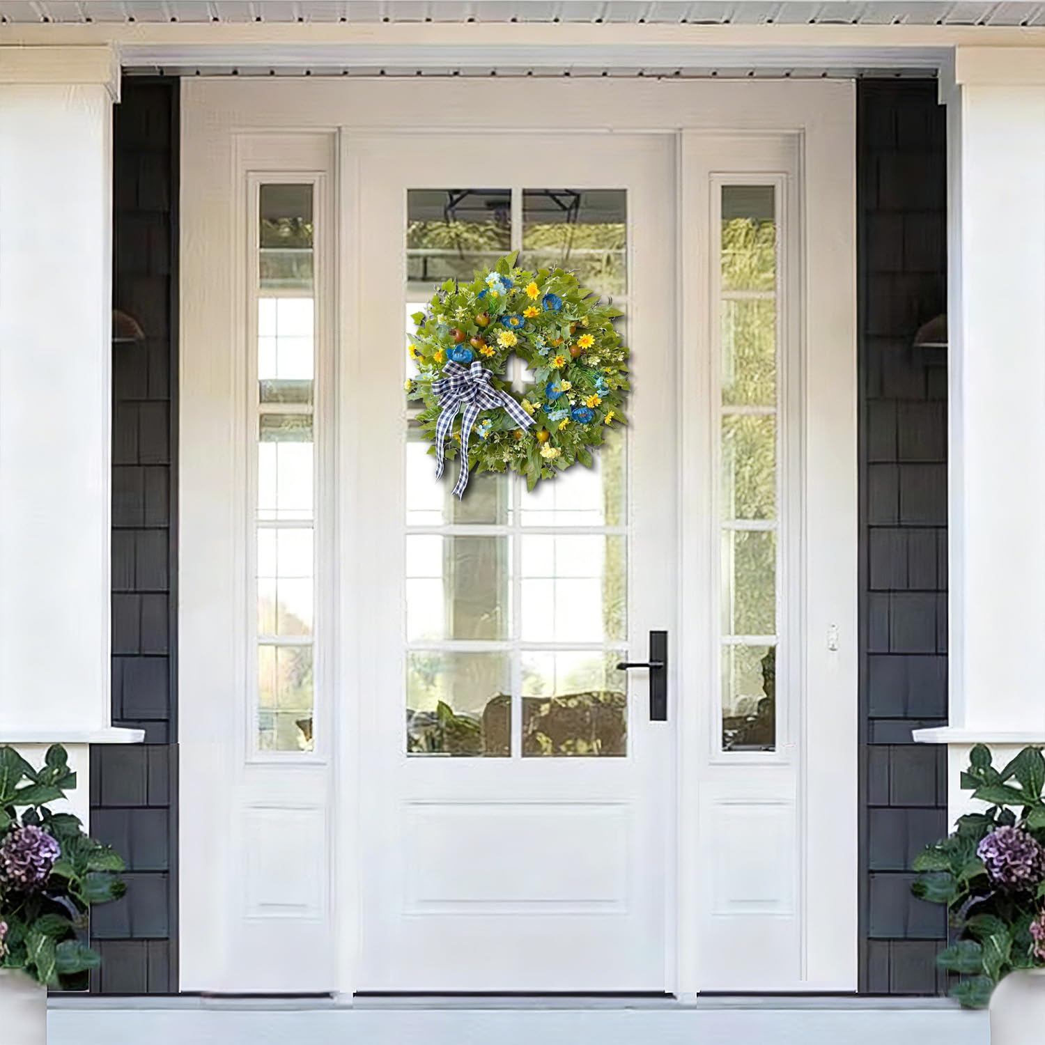 WANNA-CUL close-up shows yellow daisies and blue poppies for seasonal styling