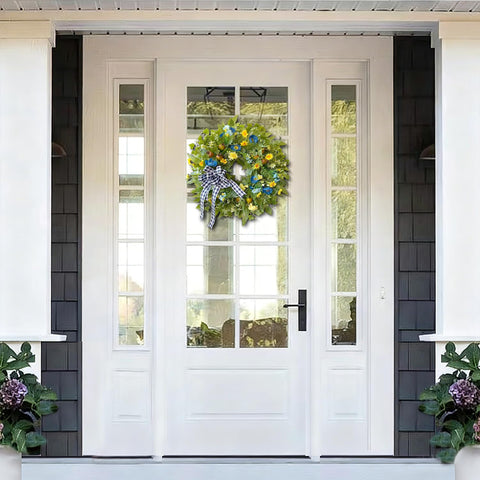 WANNA-CUL close-up shows yellow daisies and blue poppies for seasonal styling