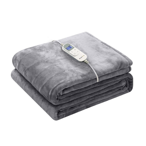 Wapaneus heated blanket throw on couch delivering plush warmth