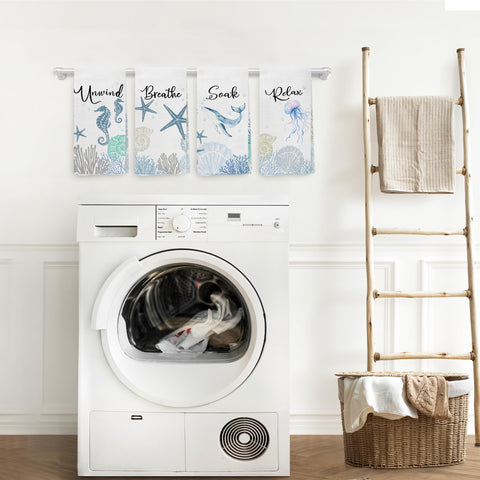 WARDOS Coastal towels dry hands in a bright, practical kitchen setting