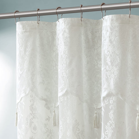 Warm Home Designs Ivory Lace Shower Curtain with seven tassels adds timeless texture.