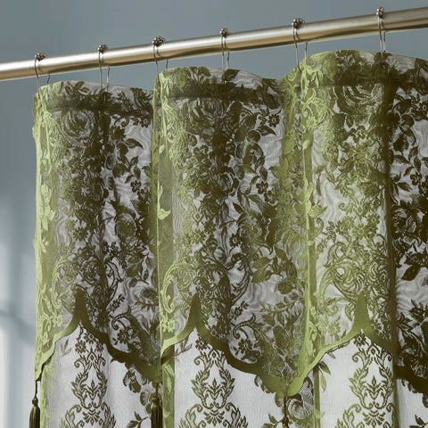Warm Home Designs sage green lace curtain shows tassels and valance for classic farmhouse style