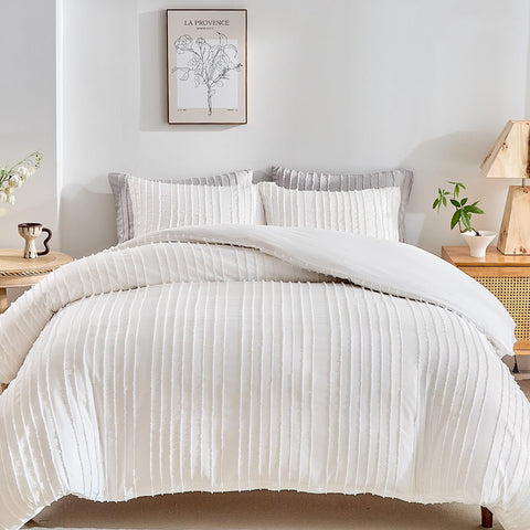 WARMDERN White Boho Duvet Cover with striped texture enhances bed decor.