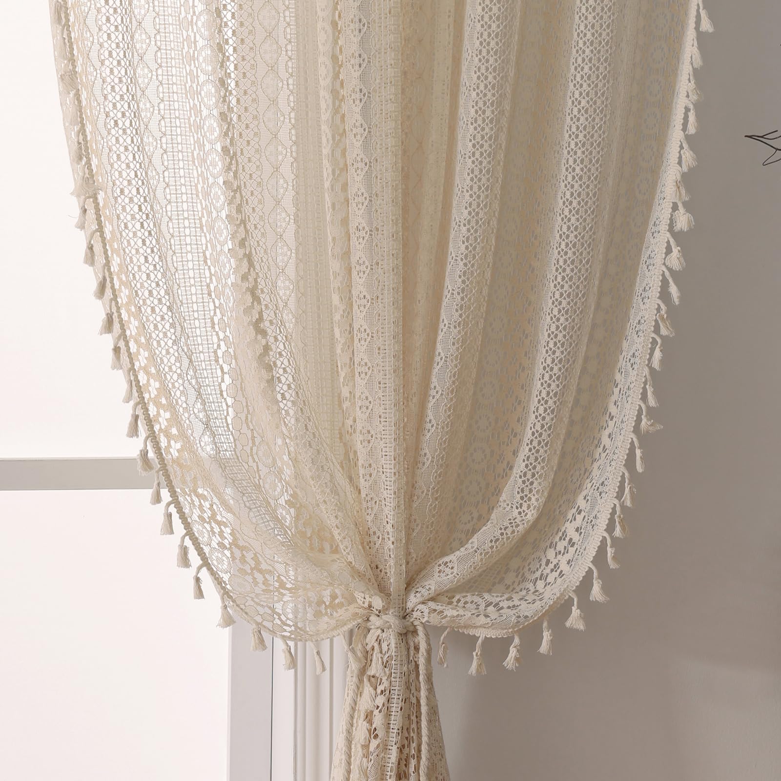 WAZZIO boho crochet curtains with rod pocket create soft living room ambiance and light filtering.