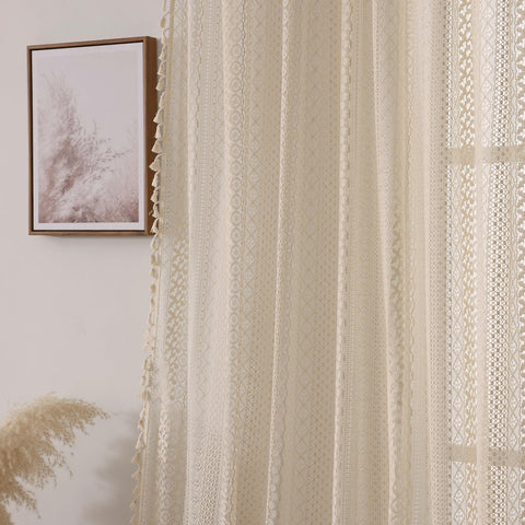 WAZZIO tassel-detail crochet curtain adds vintage charm and texture