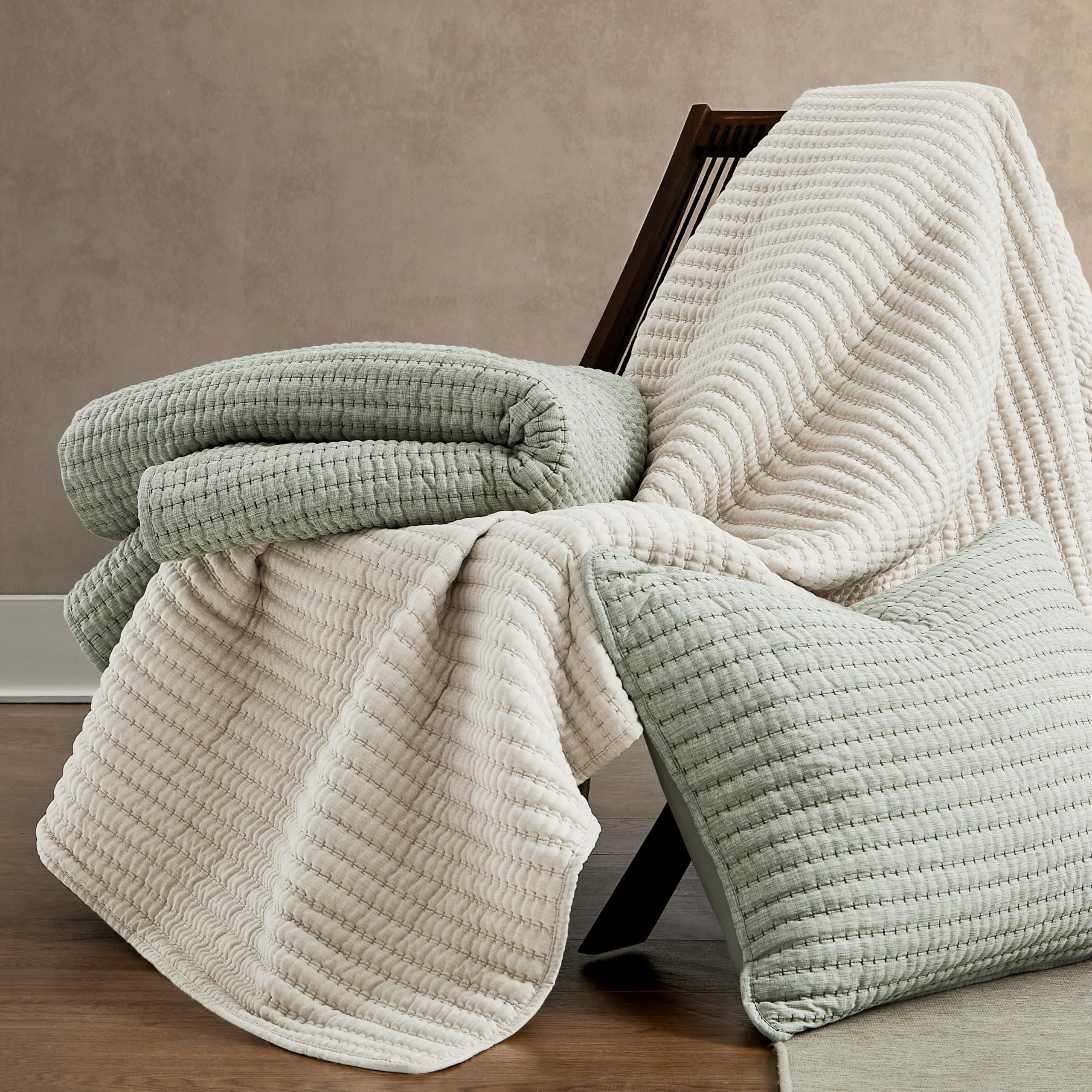 WDCOZY beige pick-stitch lightweight layer suitable for all seasons on bed.