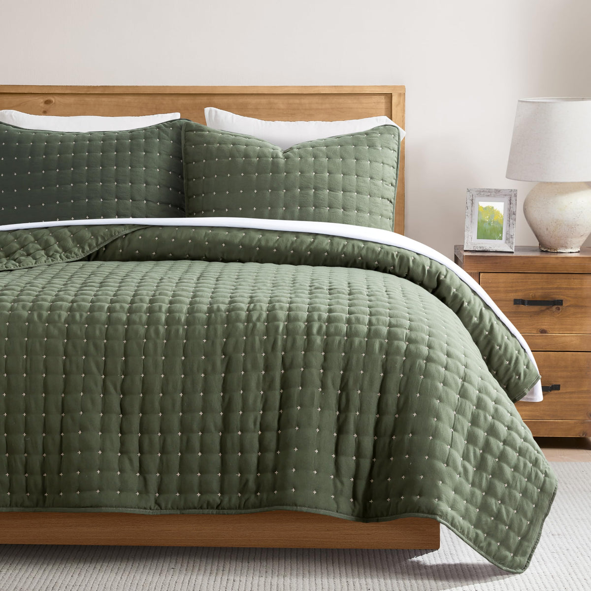 WDCOZY king-size quilt in moss green closeup showing soft touch for coziness